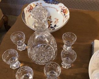 One of two very nice cut glass decanters with glasses