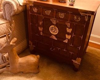 One of several unique chests. Team wood with brass fittings