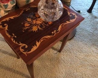 Small Italian table with inlay. Cut glass rose bowl.