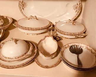 One of many many sets of antique china sets. Hand painted. Interesting and unique handles and designs.