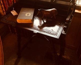 Unique desk. Folds up nicely and resembles a suitcase