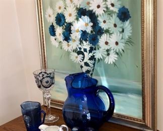 Daisy painting and cobalt blue items