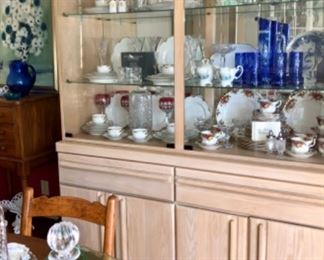 blond oak chine cabinet with glass top display space.  