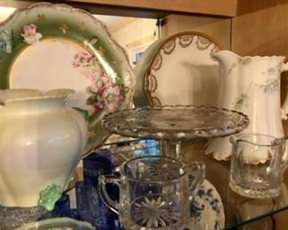 Collection of antique Heisey and china pieces