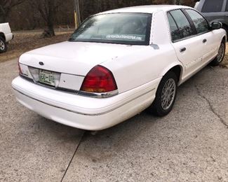 White Ford crown Victoria with new battery