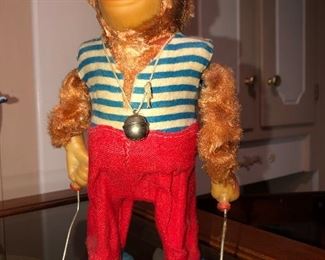 Vintage jumping monkey toy.  