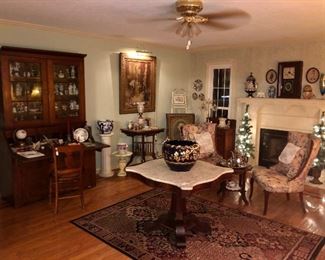 Room photo of main living space.  Filled with antiques 