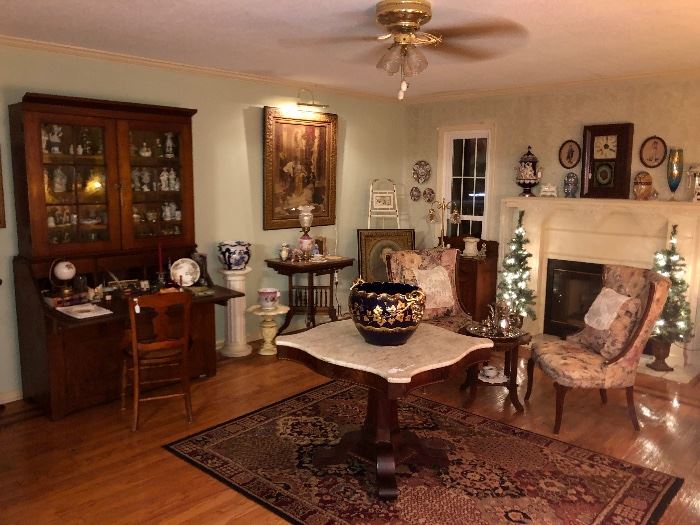 Room photo of main living space.  Filled with antiques 