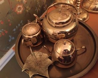 Selection of brassware.