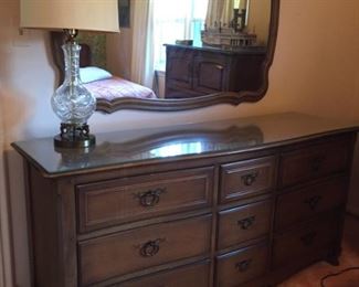 Bureau, mirror and lamps.