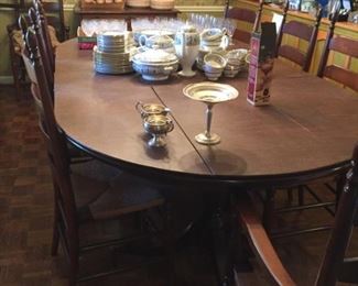 Dining room table and chairs.