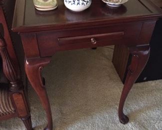 Matching end tables with pullout.