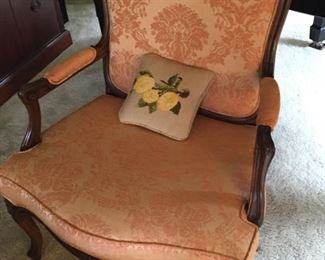 Upholstered armchair.