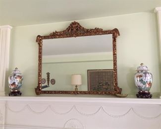 Mirror and Asian ginger jars.