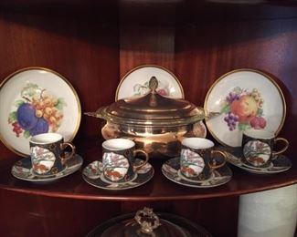 Cups and saucers and decorative plates.