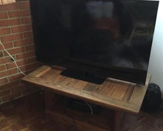 Flat screen TV and stand.