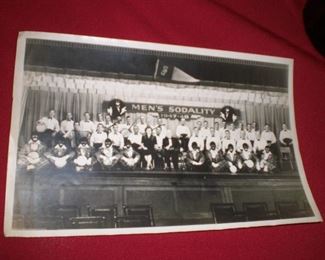 Men's Sodality 1947-48 photograph showing 8 members in black face