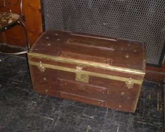 small pine trunk with brass buttons and tray