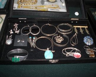 trays full of sterling jewelry