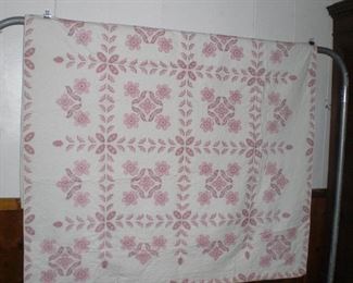 a pair of hand made quilts and more