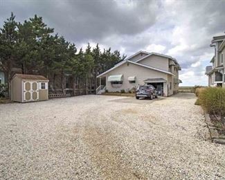 62nd St bayfront home with shed