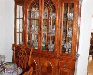 Beautiful china cabinet - also having matching dining table with 8 chairs and buffet