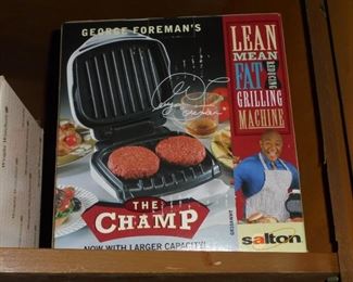 George Foreman grilling machine in box