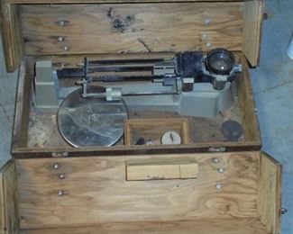 Old scale in wooden box