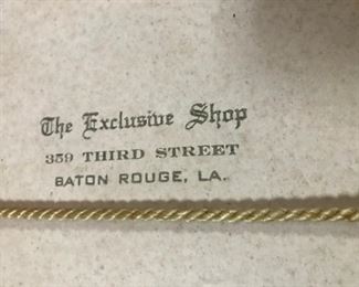 The Exclusive shop vintage hatbox label