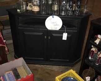 Corner TV Cabinet  and Empty Collectible Liquor Bottles