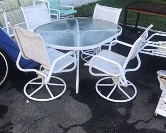 Patio Table with Four Swivel Rocking Chairs, Made by Telescope Furniture in Granville, NY. 
