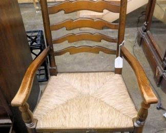 Solid oak arm chair w/rush bottom
