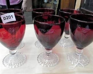 6 red Louisiana water glasses
