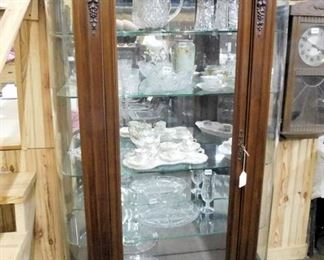 ROUND FRONT MAHOGANY CHINA CABINET HAS BEVELED GLASS IN DOOR