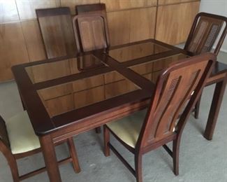 Dining set with 2 leaves, 6 chairs, and lighted Hutch