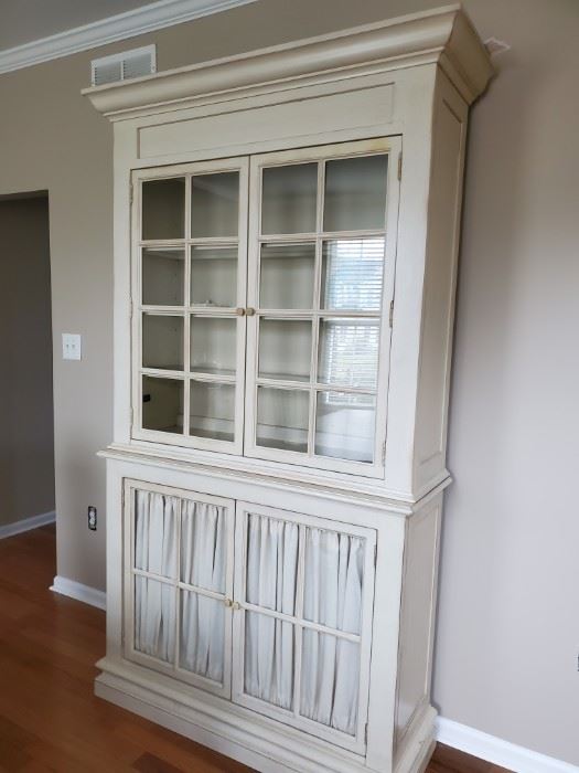 This hutch is so beautiful stands 88x47x 16 3 1/4 no scratches perfect condition. 5 shelves. 4 glass doors and attacked privacy curtains on the bottom 