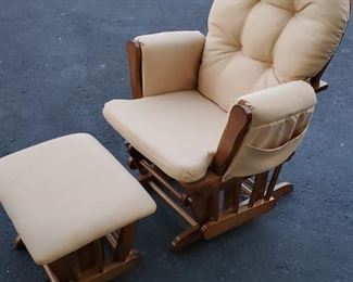Glider chair with glider foot tray talk about comfort. Once u sit down u will not wanna get back up only a few stains in great great condition