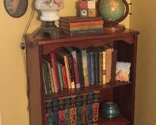 Vintage child’s or small book case filled with great book treasures 