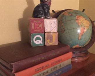 Vintage children’s books, globe, blocks, cat