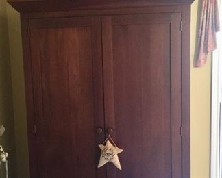 Large primitive armoire