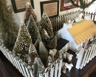 Vintage bottle brush trees, fence, primitive barn, sheep