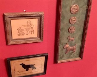 Framed carved dog buttons