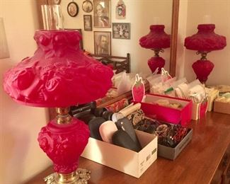 We believe these to be Fenton Red glass antique parlor lamp set. These are just beautiful!
