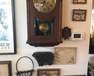 Antique wall clock, vintage art and baskets