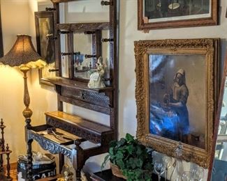 Carved English Hall stand with barley twist, glove box and umbrella stands with trays. Small black marble-top washstand or buffet, oil painting and vintage print of the signing of the armistice.
