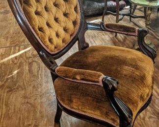Victorian slipper chair in bronze velvet with tufted back sturdy and comfortable with mahogany wood frame.