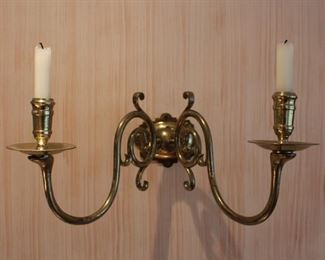 We have a pair of Georgian brass sconces.