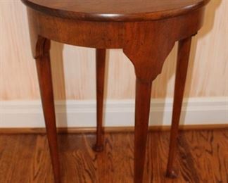 Sweet demilune gateleg table. Measures: 27 3/4" H x 34" W x 17" D folded, open 34" round.