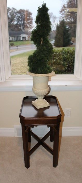 Small side table shown with urn.