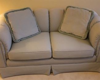 Beautifully upholstered love seat.